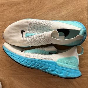 Nike running shoes, white and blue